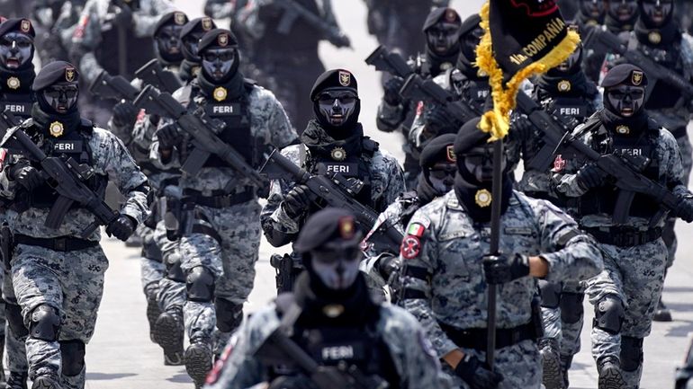 Mexican National Guards march in the Independence Day military parade...