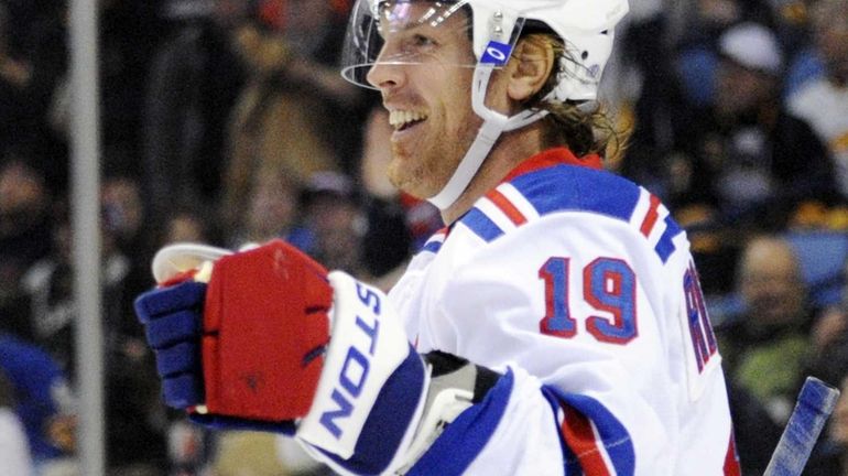 Rangers center Brad Richards celebrates his second of three goals...