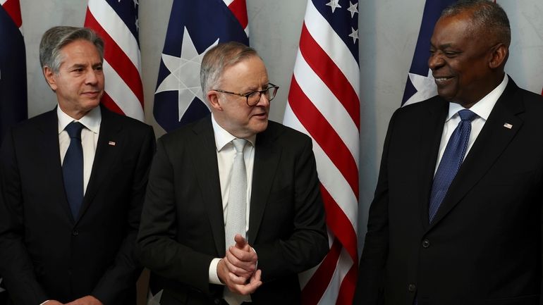 Australian Prime Minister Anthony Albanese, center, speaks with U.S. Secretary...