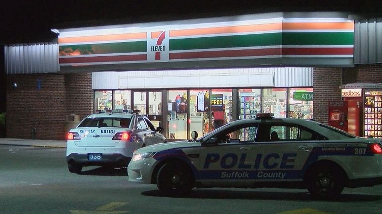 Suffolk County police at the scene of a robbery at a...