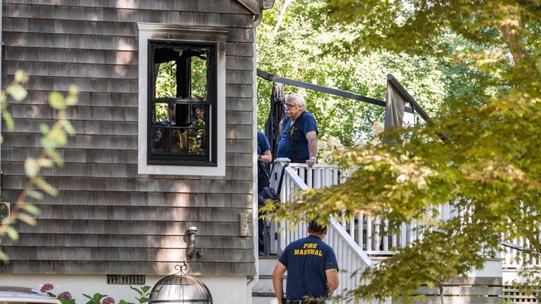 Officials from the Southampton Town Detective Division, Southampton Town Fire...