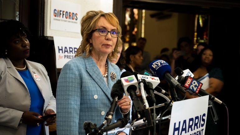 Former U.S. Rep. Gabby Giffords speaks during a campaign event...