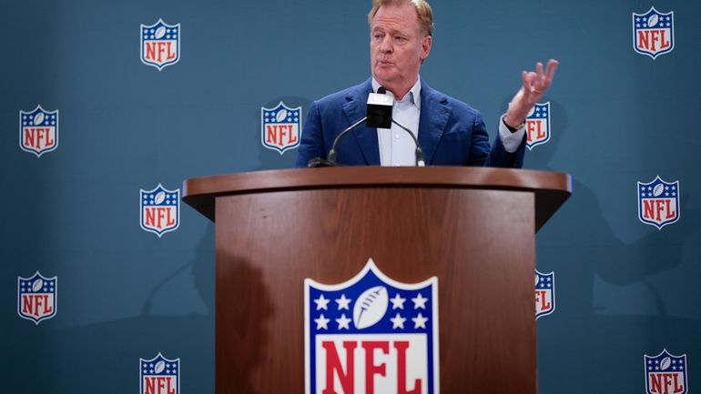 NFL Commissioner Roger Goodell responds to questions during a news...