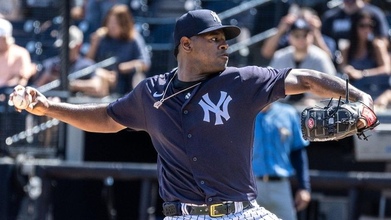 Yankees starting pitcher Luis Severino throws in the top of the first...