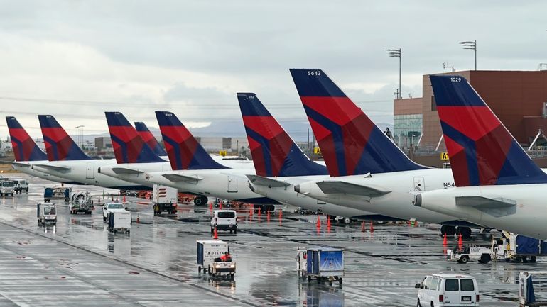 Delta planes sit at their gates on June 13, 2022,...