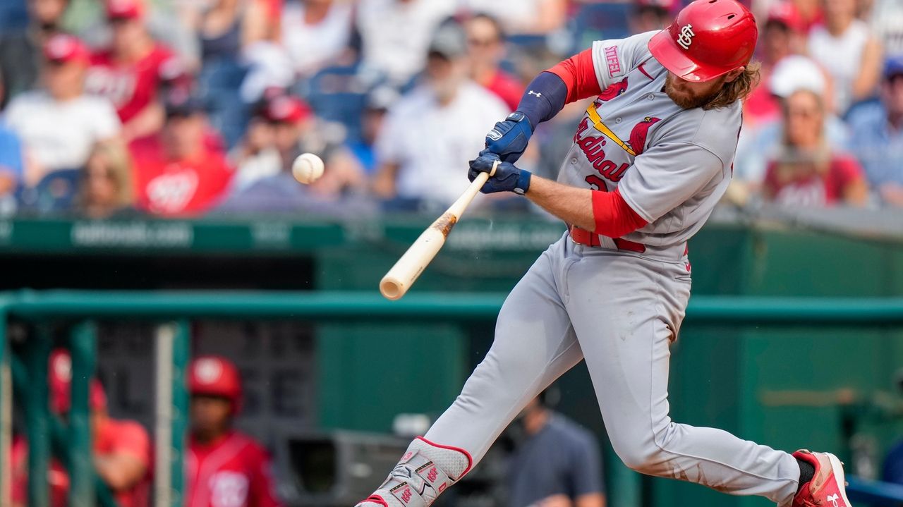 Tommy Edman of the St. Louis Cardinals celebrates a solo home run