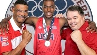 Shirley middleweight Le'Shawn Rodriguez (center), with trainer Eddie Murphy (right).