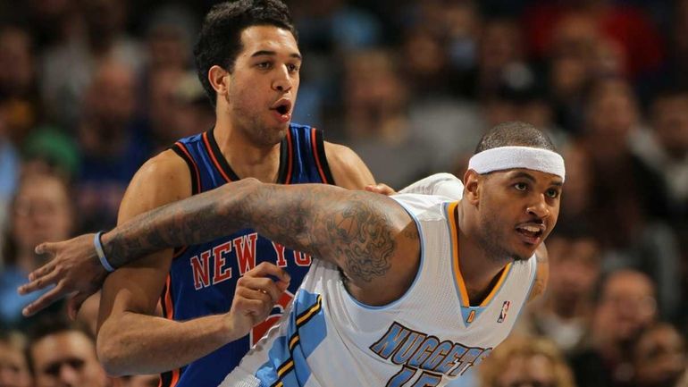 Carmelo Anthony now a New York Knick in his former...