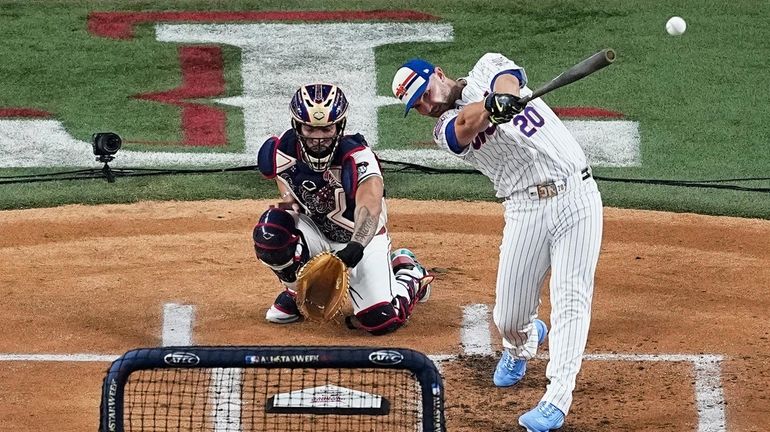 Pete Alonso, of the New York Mets, hits a home...