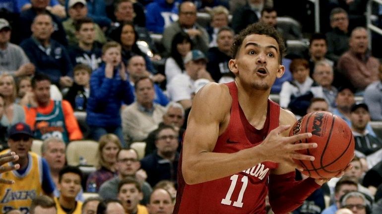 In this March 15, 2018, file photo, Oklahoma's Trae Young...