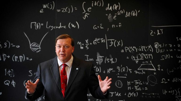 Stony Brook University President Samuel L. Stanley Jr. addresses a...