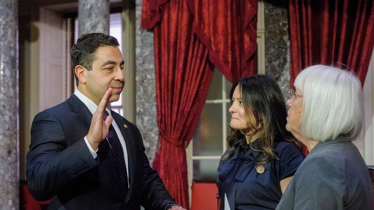 Sen. Patty Murray, D-Wash., right, administers the oath of office...