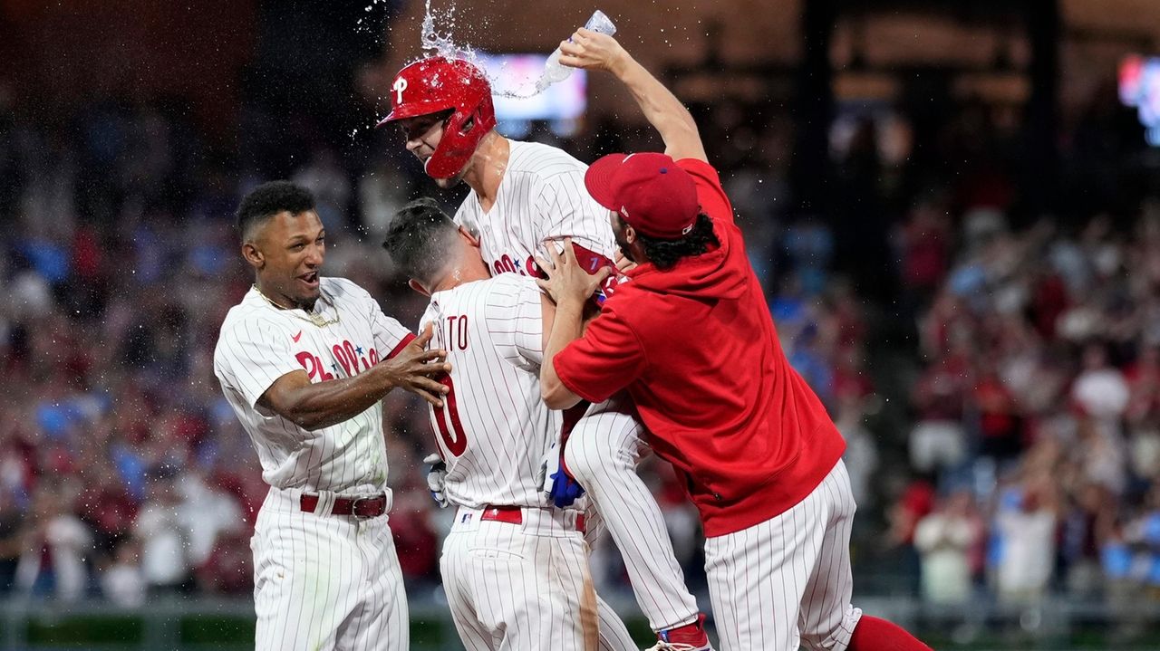 Castellanos comes up big at the plate and in the field, leading Phillies  past Braves 6-5