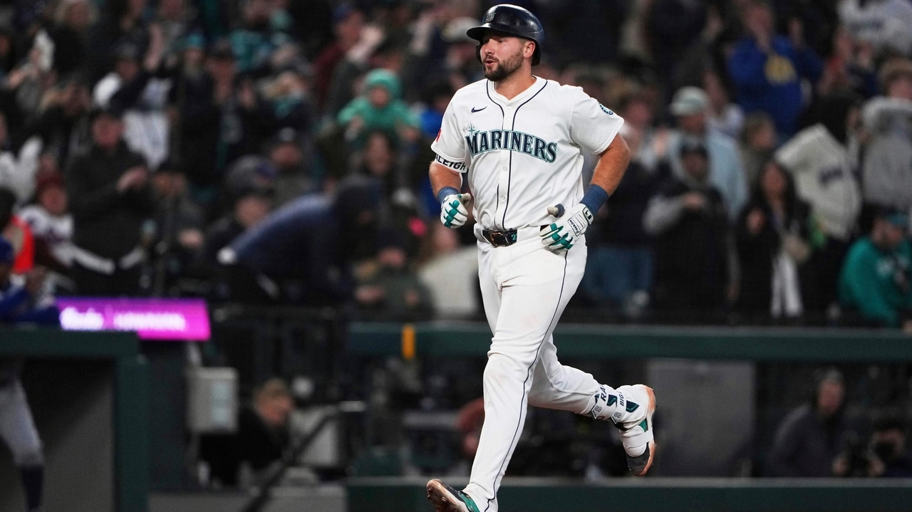 Seattle's Cal Raleigh reaches 100 career HRs by going deep twice at ...