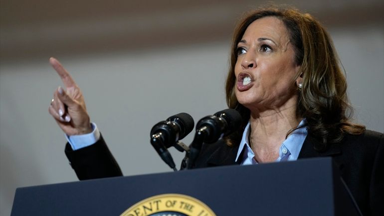 Democratic presidential nominee Vice President Kamala Harris campaigns with President...