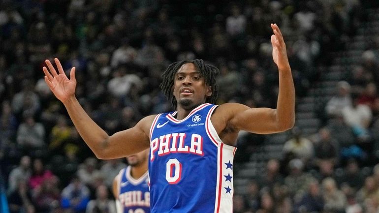 Philadelphia 76ers guard Tyrese Maxey (0) reacts after scoring against...