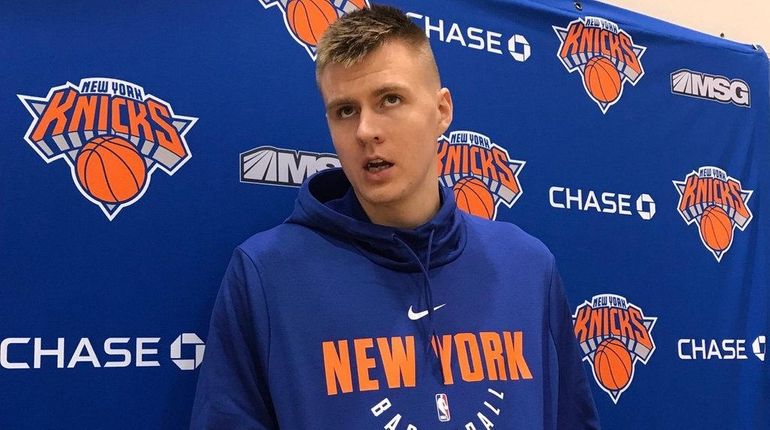 Kristaps Porzingis talks about his ankle at Knicks practice in...