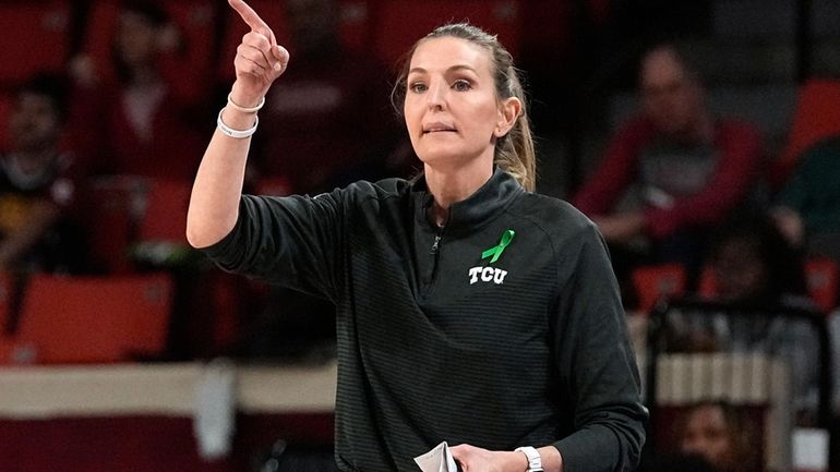 TCU head coach Raegan Pebley gestures in the second half...