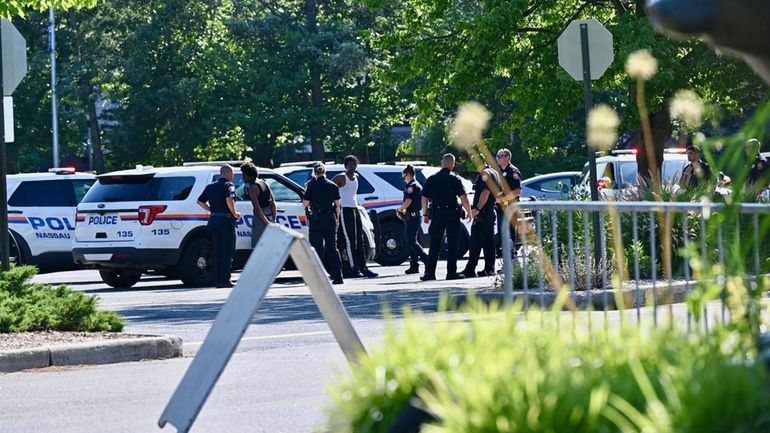 Police respond to the incident on the Hofstra campus on...