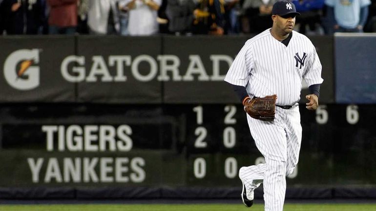 New York Yankees' CC Sabathia, No. 52, enters the game...