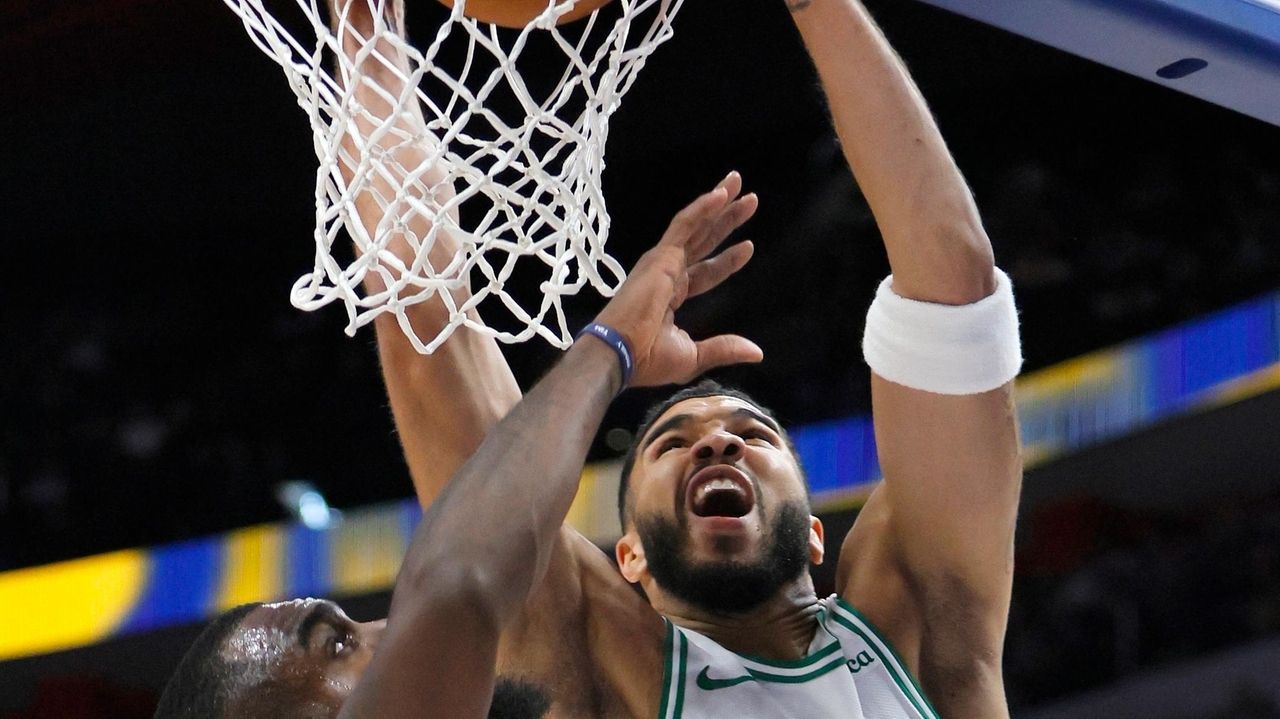 Tatum scores 37 points and Celtics hold to beat stubborn Pistons 124