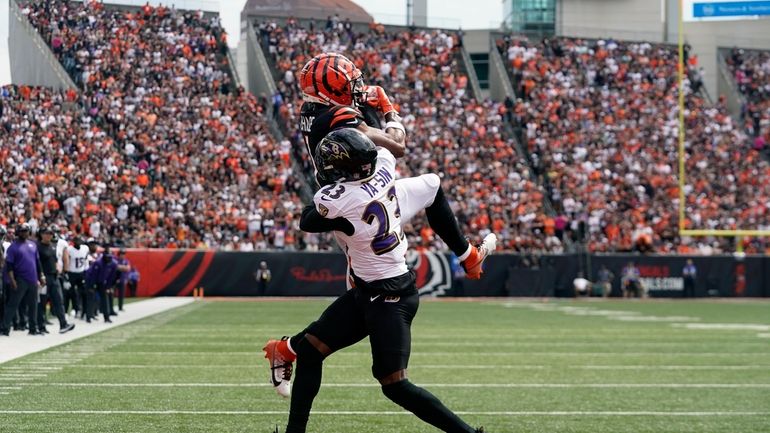 Baltimore Ravens cornerback Rock Ya-Sin (23) breaks up a pass...