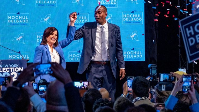 Gov. Kathy Hochul stands with Lt. Gov. Antonio Delgado after...