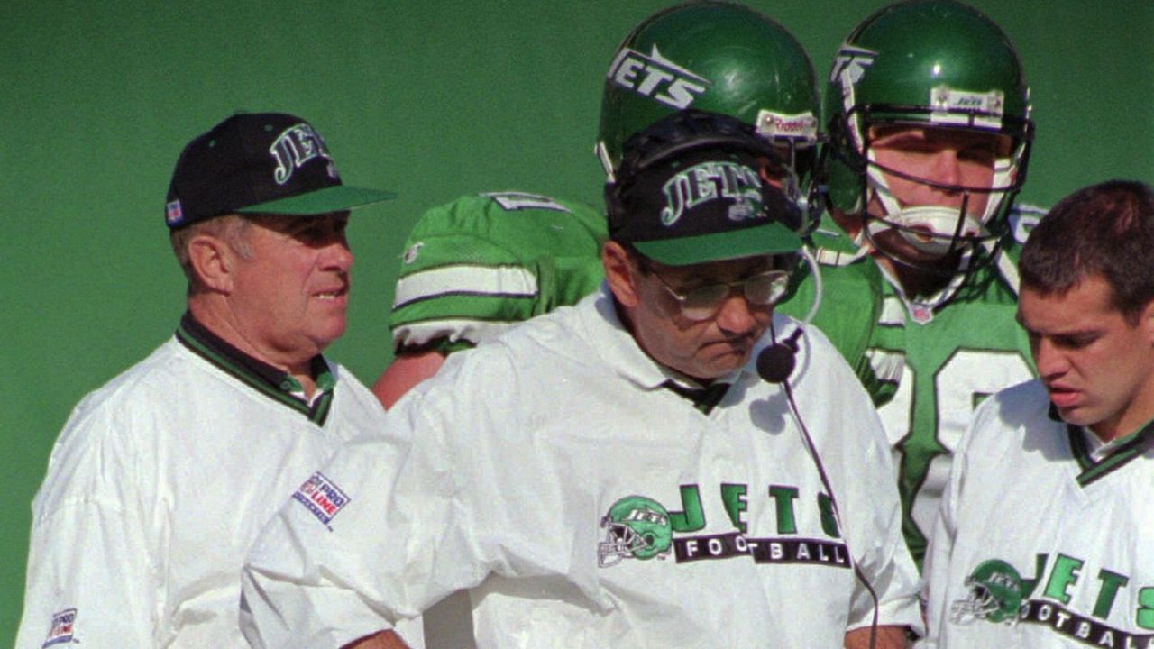 Rick Mirer of the New York Jets runs with the ball during the game