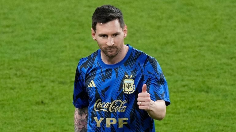 Argentina's Lionel Messi sgives a thumb up before a friendly...