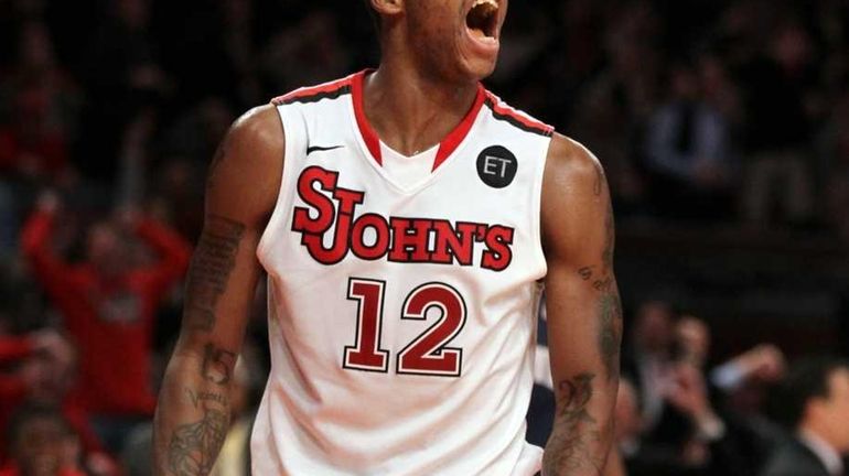 Dwight Hardy of the St. John's Red Storm celebrates a...