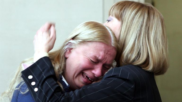 Sharon Dorsett, mother of Jo'Anna Bird, reacts to photos shown...