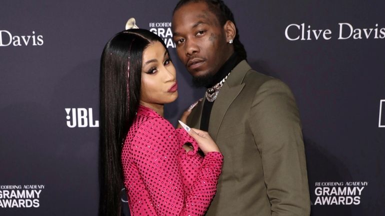 Cardi B, left, and Offset arrive at the Pre-Grammy Gala...