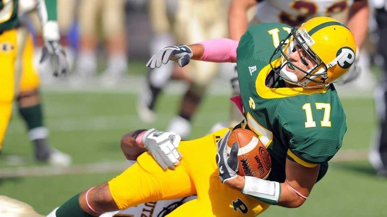 Post receiver Grayson Laurino is brought down after a gain...