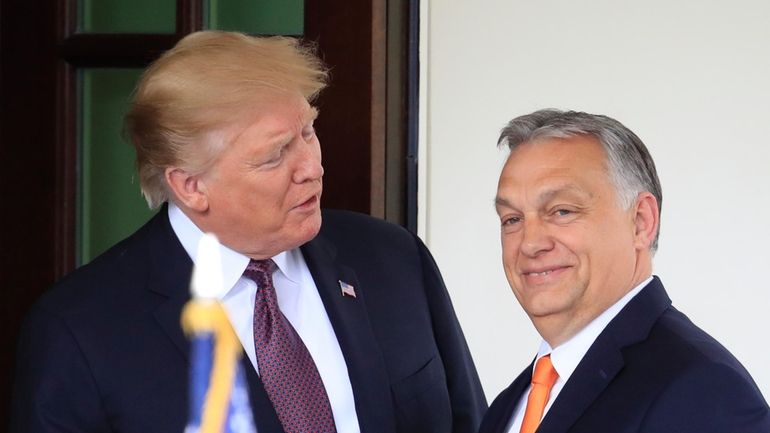 President Donald Trump, left, welcomes Hungarian Prime Minister Viktor Orban...