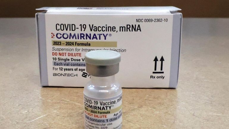 A new Pfizer/BioNTech vaccination for COVID-19, at a pharmacy in...