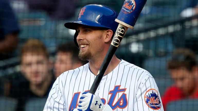 Jeff McNeil of the Mets prepares to bat in the first...