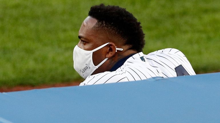 Aroldis Chapman #54 of the Yankees looks on against the Boston...