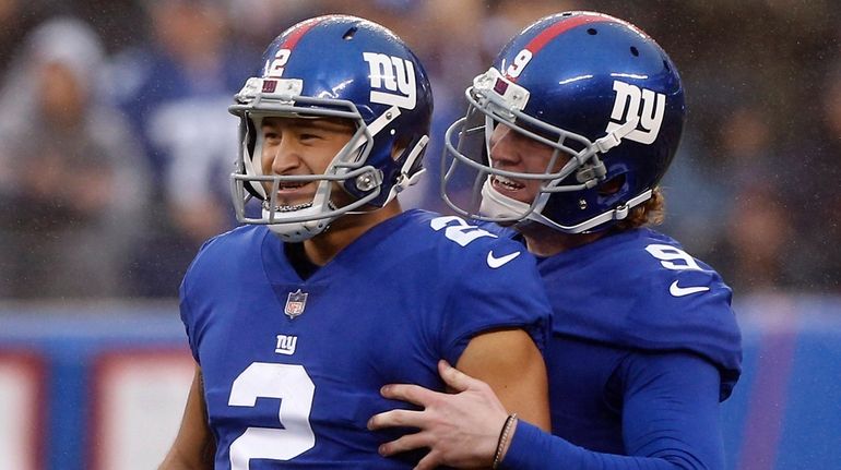 Aldrick Rosas of the Giants celebrates his second-quarter field goal...