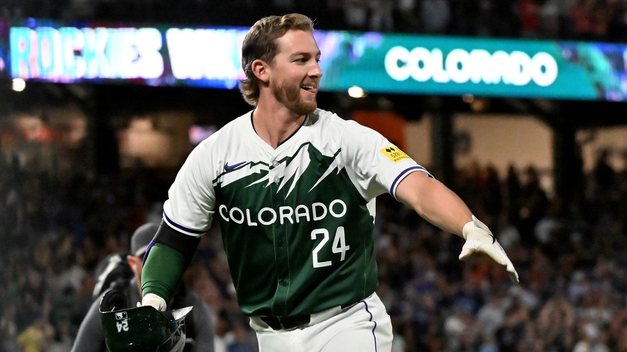 Ryan McMahon draws basesloaded walk on pitchclock violation, Rockies