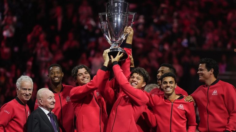 Team World's Taylor Fritz, fourth from left, and Ben Shelton,...