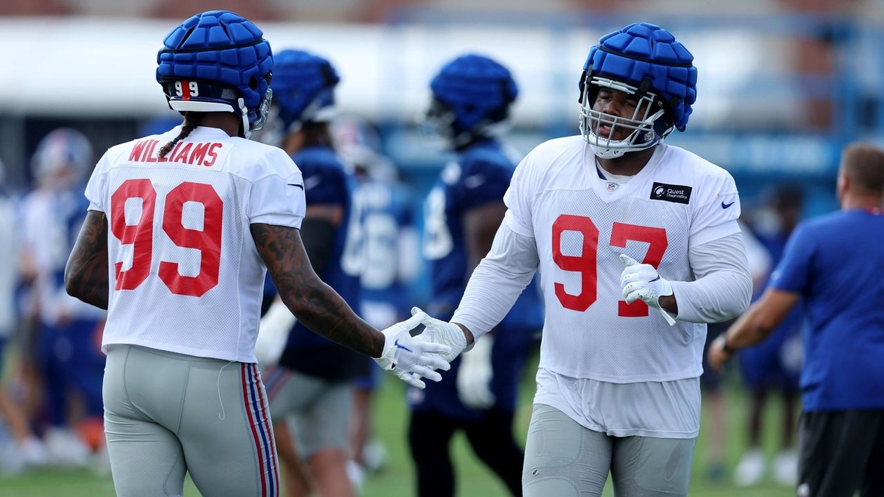 FILE - New York Giants defensive tackle Dexter Lawrence (97) takes