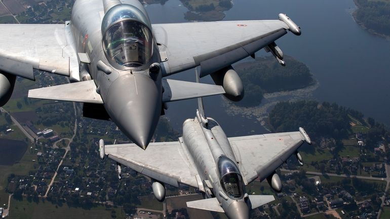 Italian Air Force Eurofighter Typhoon military fighter jets participate in...