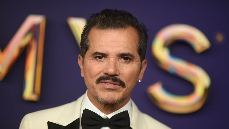 John Leguizamo arrives at the 76th Primetime Emmy Awards on...