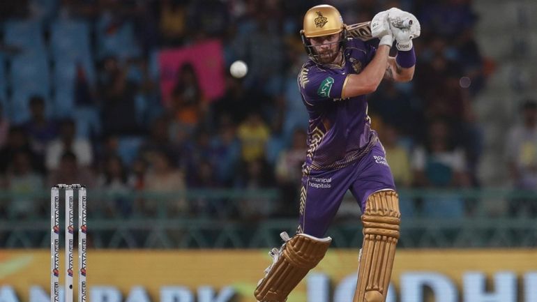 Kolkata Knight Riders' Phil Salt plays a shot during the...