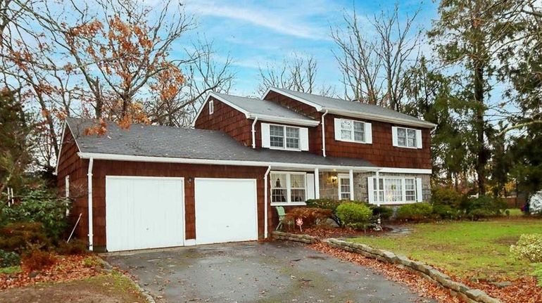 Listed for $449,999, this four-bedroom, 2.5-bathroom house in Medford has...