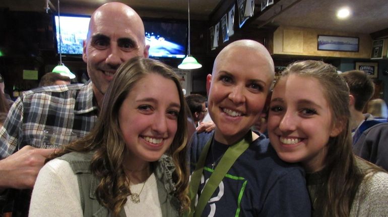 Kathleen Gagliardi, second from right, husband Gary and twin daughters...