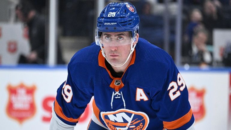 Islanders center Brock Nelson sets before a faceoff against the...