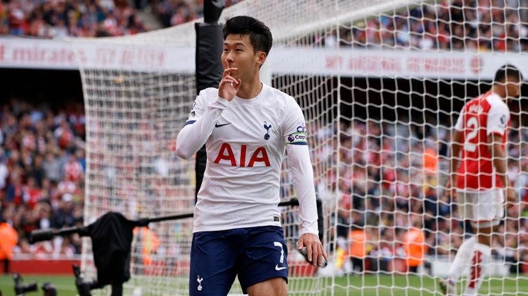 Tottenham's Son Heung-min celebrates after scoring his side's second goal...