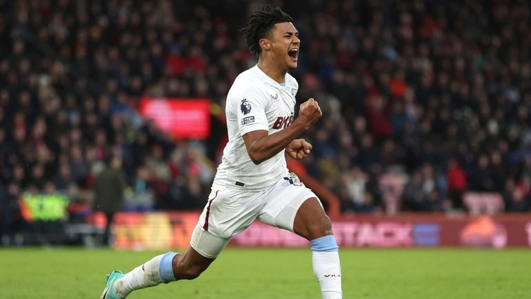 Aston Villa's Ollie Watkins celebrates scoring his side's second goal...