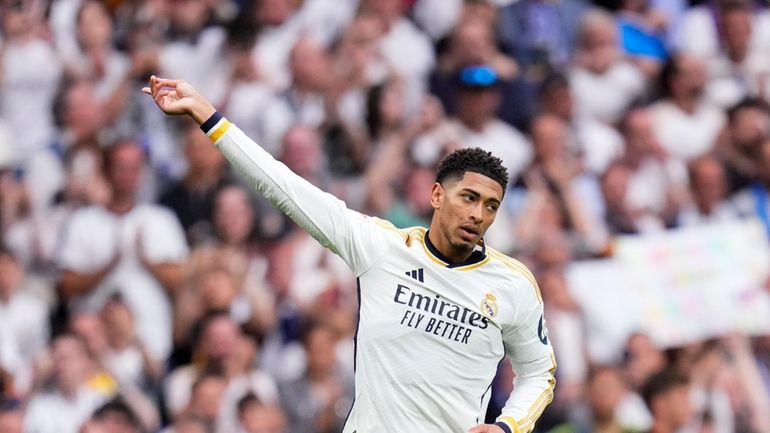 Real Madrid's Jude Bellingham celebrates after scoring his side's second...